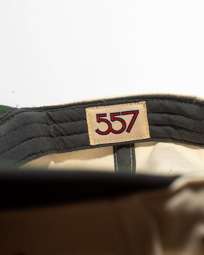 Close-up of a label with the number '557' on a product, likely a shoe or boot.